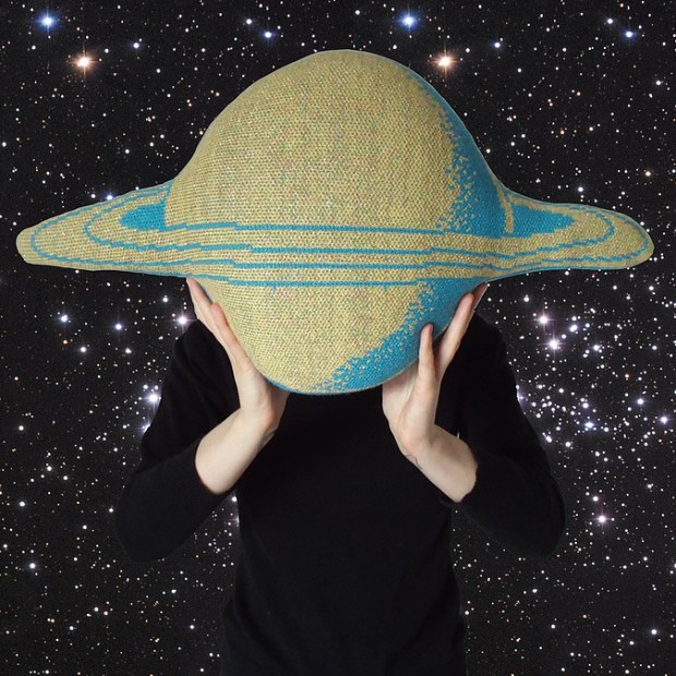 Saturn knitted cushion by Kandy Diamond. Photo source.